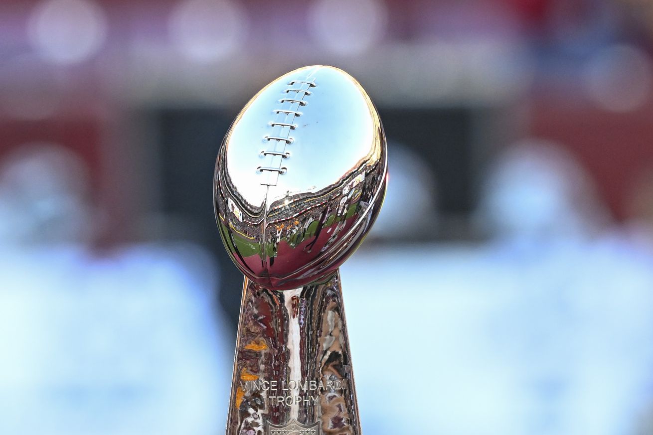 A view of a Lombardi trophy on the field as Washington football legend Darrell Green was honored by the Washington Commanders during the ceremony to retire his number at Northwest Stadium on October 20, 2024 in Landover, Maryland.