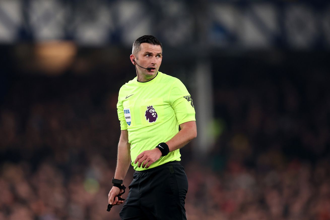 Referee Michael Oliver looks on during the Premier League match between Everton FC and Liverpool FC at Goodison Park on February 12, 2025 in Liverpool, England.