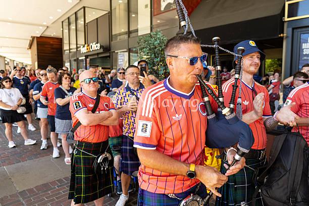 Scotland fans play bagpipes